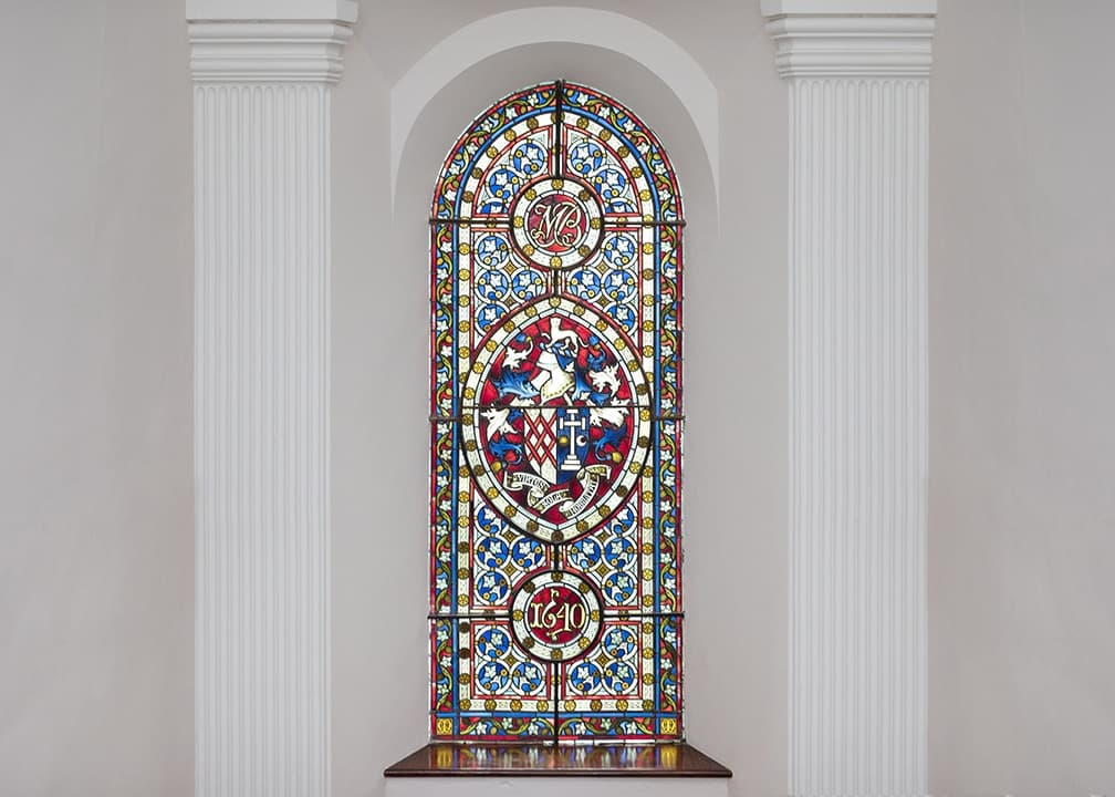 Stained glass with the Blake family crest